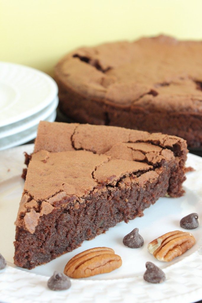This recipe for Chocolate Pecan Flourless Cake is gluten free, dairy free and super tasty!  It will become a family favorite!
