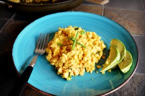 This Spicy Asian Tofu Scramble takes on the flavors of sesame and ginger, and the spice of sriracha.  Chopped scallions add a fresh crisp to this hearty and delicious scramble.