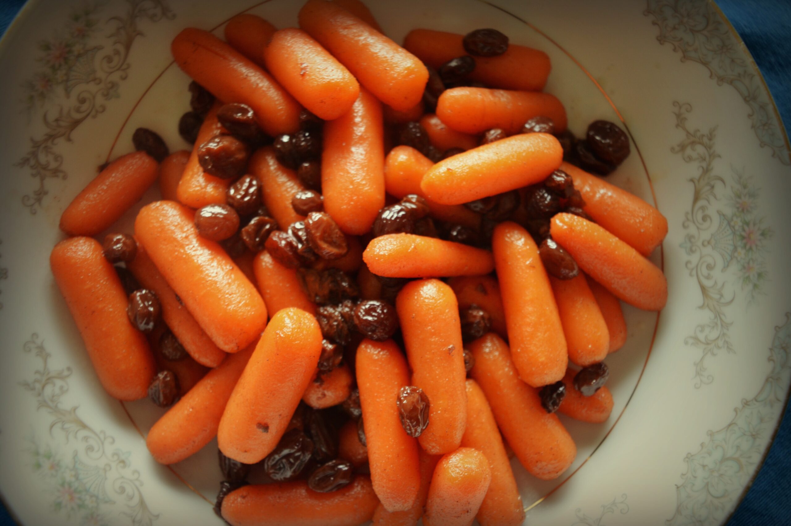 Tzimmes is a sweet vegetable dish, which makes an excellent addition to your Hanukkah feast. There are many different variations, but they are all made with root vegetables and dried fruit.