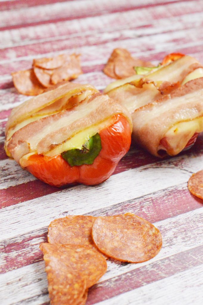 I love stuffed peppers!  Here is a new way to make them - Pizza Stuffed, Bacon Wrapped Peppers!   Yes they are dairy and gluten free!