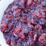 Make your holiday pop with this tangy Homemade Cranberry Sauce!   I absolutely love using fresh cranberries to make sauces and this homemade cranberry sauce is so yummy as any side dish.  Don't be scared to try making this with fresh berries, it is so easy and so tasty.