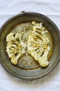 This recipe for Seasoned Cauliflower Steaks is a light and clean side dish for a main meal.