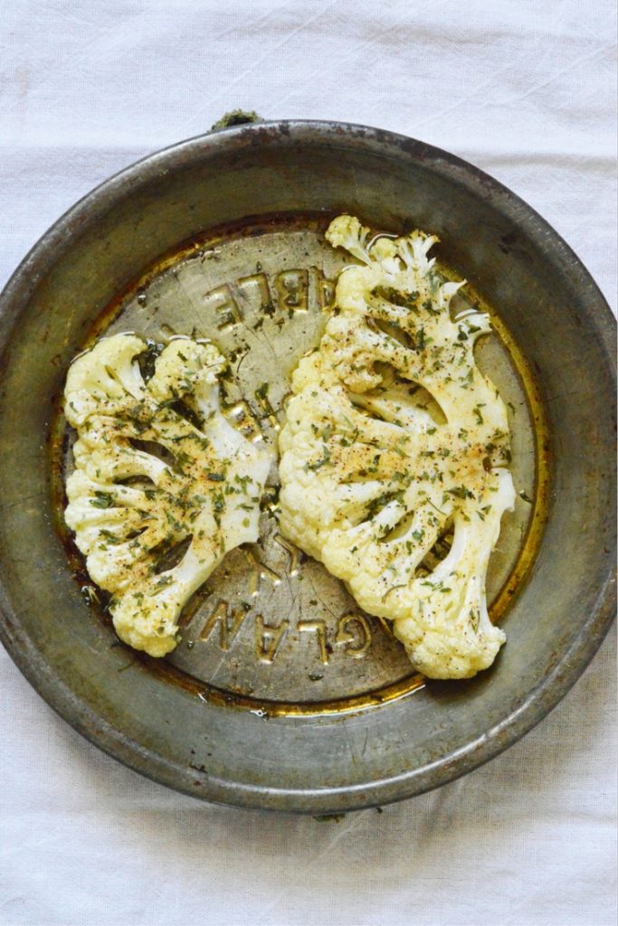 This recipe for Seasoned Cauliflower Steaks is a light and clean side dish for a main meal.