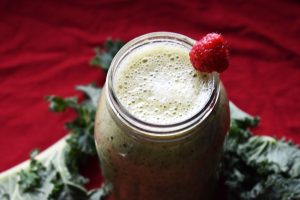 Here is the perfect solution for St. Patrick's Day or other holidays!  Serve a clean delicious green - Raspberry Banana Kale Smoothie!   See how easy it is to eat clean and plant based?  Yes this drink will be green!  This recipe is dairy free and gluten free.  All ingredients used are organic if possible.