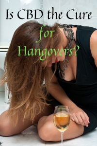 girl slumping over on the floor with glass of alcohol